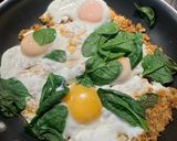A picture of step 4 of Eggs Fried in Parmesan Breadcrumbs with Wilted Spinach.