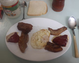 Foto del paso 6 de la receta: Huevos fritos con tocino y pimientos rellenos