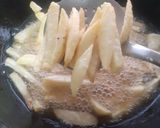 A picture of step 4 of Mayo garlic French Fries.