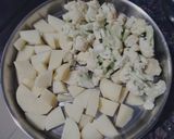 A picture of step 1 of Cauliflower &, potato dry vegetable.