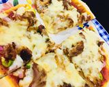 A picture of step 3 of Creamy Tikka pizza.