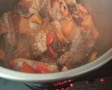 Une image de l'étape 2 de Travers de porc tomate et pommes de terre à la Nutricook.