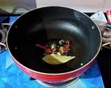 A picture of step 7 of Bashonti Pulao r Chicken Kosha.