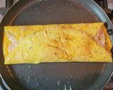 Foto del paso 3 de la receta: Omelette jamón, muzza y albahaca