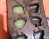 Foto del paso 13 de la receta: Bombones de chocolate con relleno de mandarina