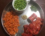 A picture of step 1 of Carrot and Peas Curry.