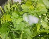 A picture of step 1 of Mustard leaves in Garlic sauce.