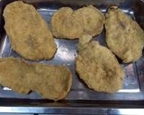 Foto del paso 9 de la receta: Milanesas a la napolitana con papas fritas y huevos fritos