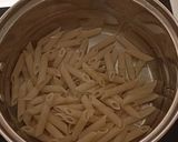 A picture of step 2 of Cheesy broccoli bacon pastabake.
