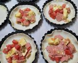 Foto del paso 5 de la receta: Tarteletas con tomate, huevo, jamón y queso