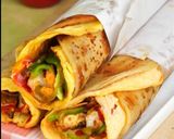 A picture of step 12 of Beloved Egg Chicken (Kathi) Roll.