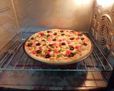 A picture of step 4 of Chicken Tikka Pizza 🍕🍕.