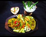 A picture of step 6 of Kathiyawadi Sizzler.