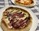 Foto del passaggio 13 della ricetta Pizze al piatto (67% idratazione) 🍕