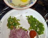 A picture of step 1 of Egg omelet with paratha.