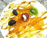 Une image de l'étape 4 de Dessert aux fruits secs (Kiwi 🥝ananas🍍 abricots 🟠 pruneau ⚫ raisin sec).