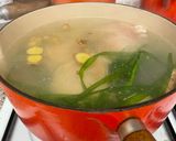 A picture of step 2 of Hainanese chicken and udon noodle broth.