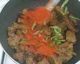 A picture of step 5 of Tala hua gosht Hyderabadi.