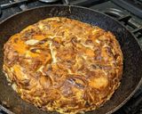 A picture of step 9 of Sweet potato, red onion and cheese Spanish omelette Tortilla.