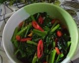 Foto langkah ke 6 dari resep Tumis sawi bawang putih.
