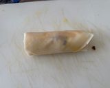 A picture of step 4 of Cheeseburger Spring Rolls.