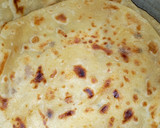 A picture of step 2 of Coconut beans with chapatis.