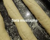 صورة لخطوة 4 من وصفة خبز 🍞 الباڤيت الفرنسي