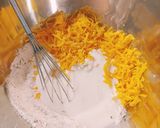 A picture of step 4 of Cheesy Buttermilk and Herb Biscuits.