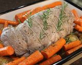 A picture of step 4 of Hearb roasted leg of lamb roll with potatoes and carrots.