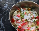 A picture of step 4 of Besan onion tomato chilla.