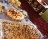 صورة لخطوة 13 من وصفة 🍕 البيتزاااا العملاقة 🍕 4xl 😍😍😍