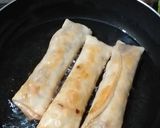 A picture of step 11 of Veg rolls.