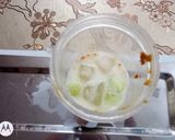 A picture of step 2 of Masala chaach (Peeled cucumber and peanut).