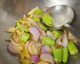 A picture of step 3 of Karela mirchi.