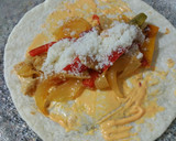 Foto del paso 9 de la receta: Fajitas de pollo con pimientos y queso