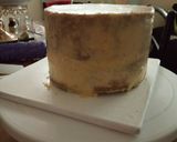 A picture of step 7 of Chocolate with ground nuts cake covered in fondant.