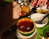 Hình bước làm 4 của món Cocktail dưa hấu Sải Duần và rượu táo mèo Sapa