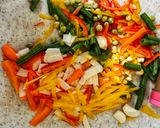 A picture of step 1 of Peri Peri Paneer Steak with Tossed Vegetables.
