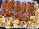 Cinta de lomo de cerdo en adobo al horno con papas panaderas