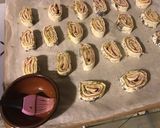 Une image de l'étape 7 de Roulés feuilletés jambon blanc, pesto et pavot bleu.