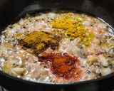 A picture of step 2 of Ghooguni (Spicy White peas curry).