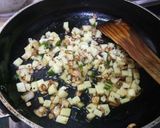 A picture of step 1 of Tadka Curd Curry.