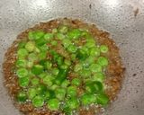 A picture of step 2 of Barnyard Millets and Peas Jeera Rice.