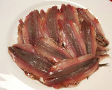 Foto del paso 6 de la receta: Cazuela de boqueroncillos, en salsa de tomate, ajo y perejil