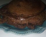 A picture of step 5 of Chocolate pancakes topped with homemade chocolate sauce.