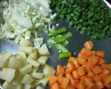 A picture of step 2 of Bengali khichuri recipe.