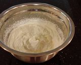 A picture of step 24 of Fresh Rasberry Cake Roll with Whipped White Chocolate Ganache Filling and Frosting.