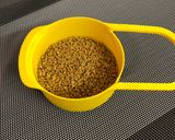 A picture of step 1 of Methi Coconut Laddu.