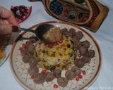 A picture of step 10 of Persian Pomegranate Rice with Pistachio and Raisins.