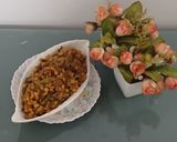 A picture of step 6 of Bitter gourd with chana dal masala.